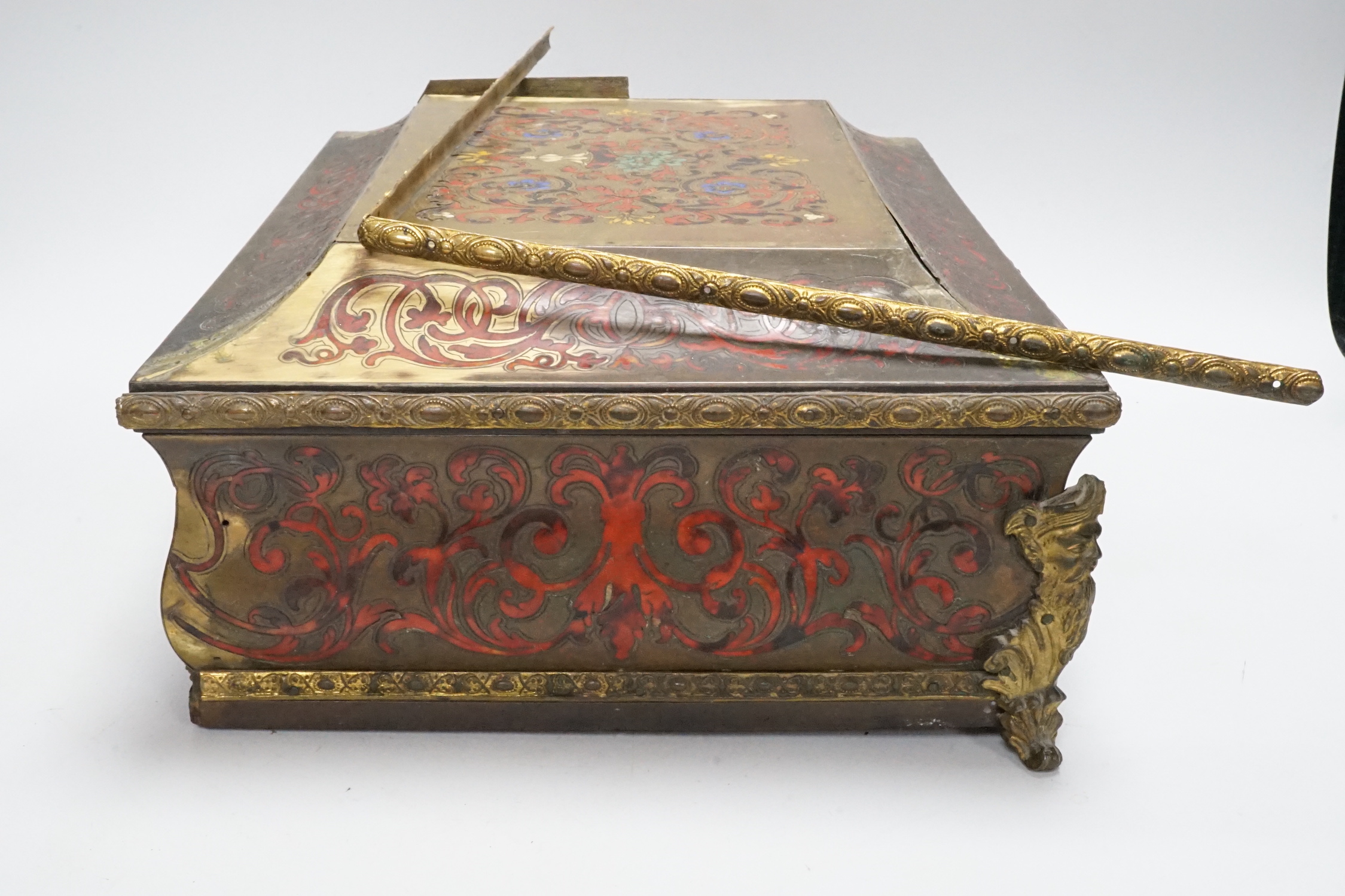 A 19th century French scarlet boulle and tortoiseshell box, 32cm wide, 25cm deep (a.f.)